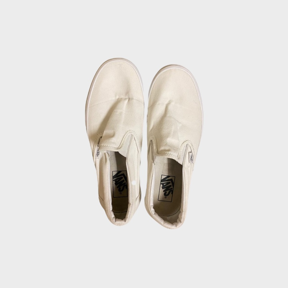 white slip on vans
